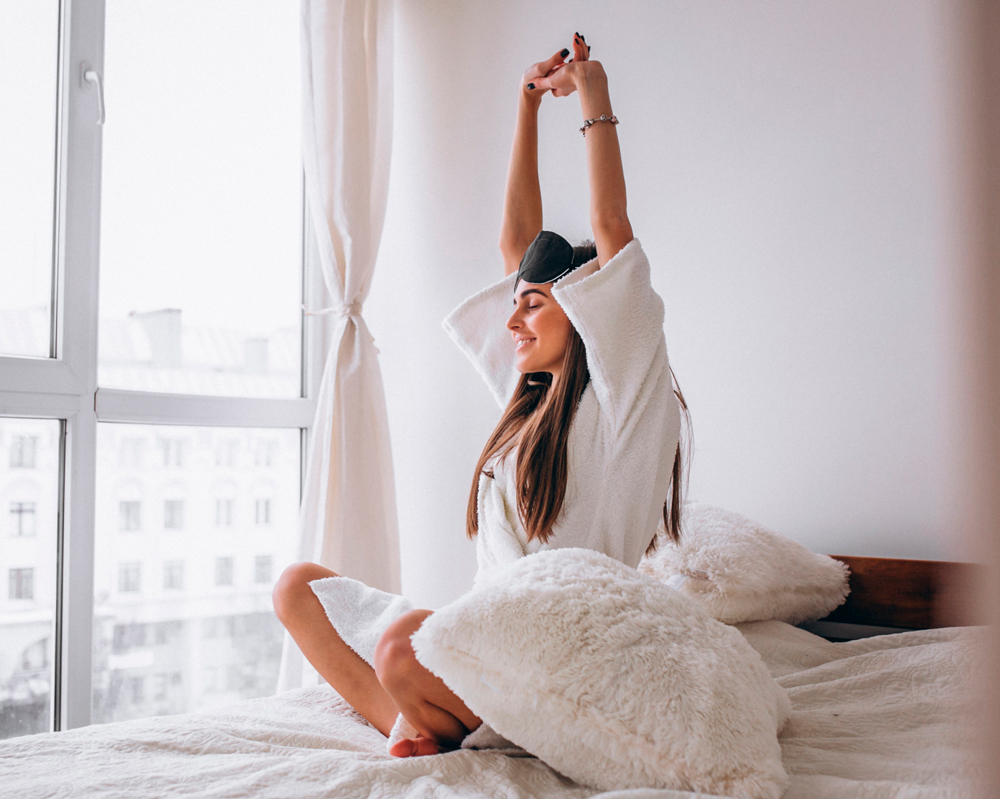 woman-bed-wearing-sleeping-mask